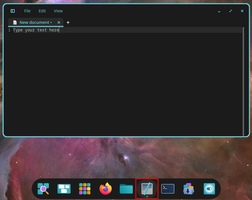 COSMIC Text Editor accessible by clicking the notepad and pen icon in the dock